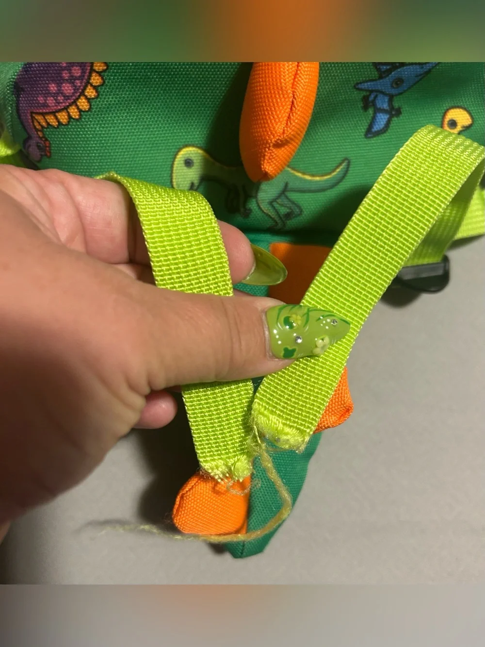 Green Kids Dinosaur Backpack with Orange Spikes